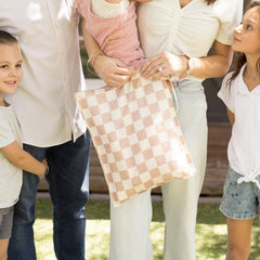 Tiny Twinkle Wet Bag folded flat for compact diaper bag storage