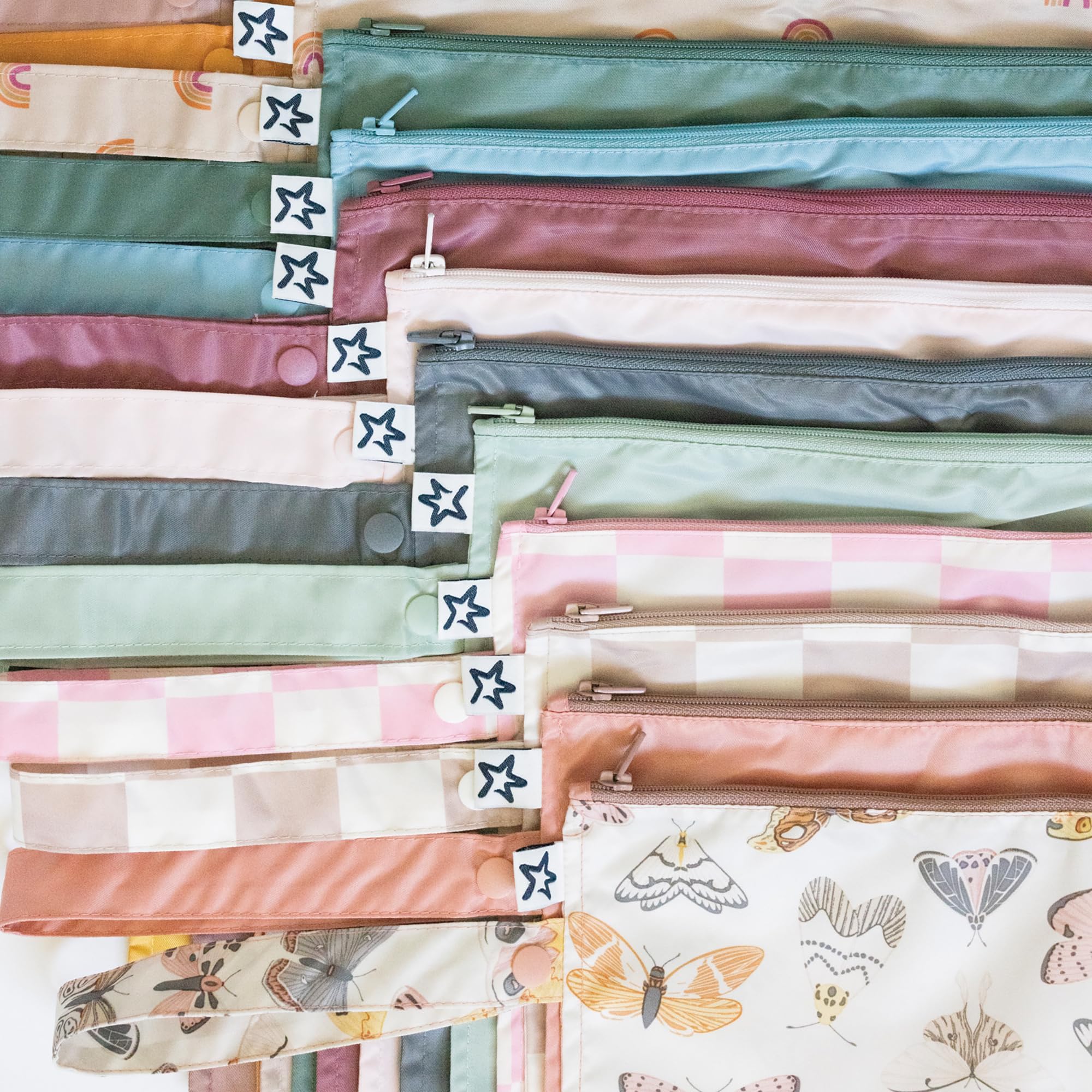 Tiny Twinkle Mess Proof Wet Bags waterproof fabric close-up, quick-dry surface