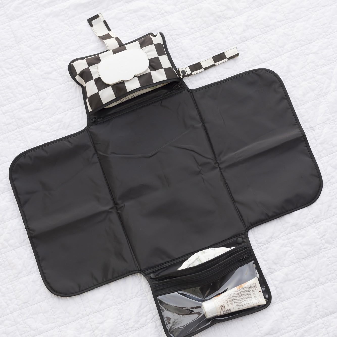 Tiny Twinkle portable changing pad storage pockets keep supplies organized