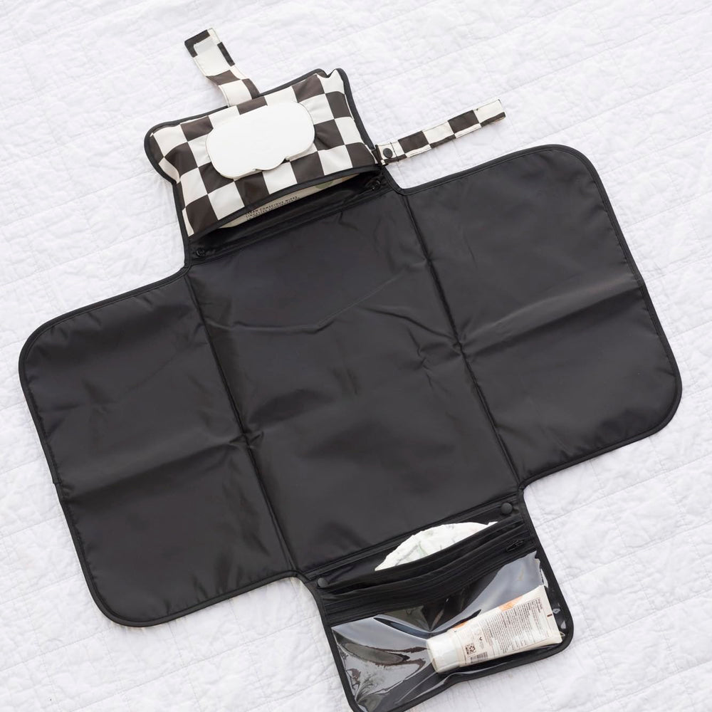 Tiny Twinkle portable changing pad storage pockets keep supplies organized
