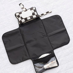 Tiny Twinkle portable changing pad storage pockets keep supplies organized