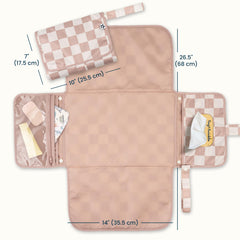 Tiny Twinkle portable changing pad with wipes-pocket enables quick, one-handed diaper changes.