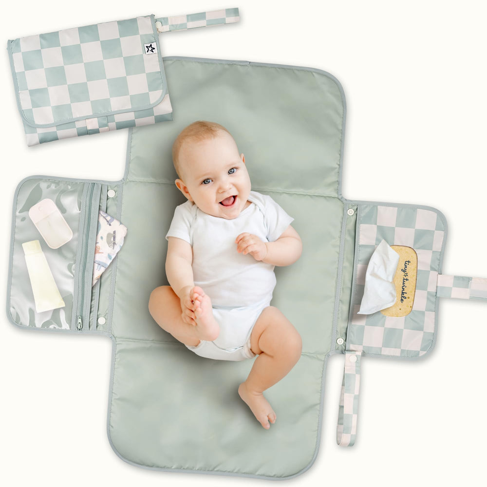 Tiny Twinkle portable diaper changing pad folded flat for compact travel storage