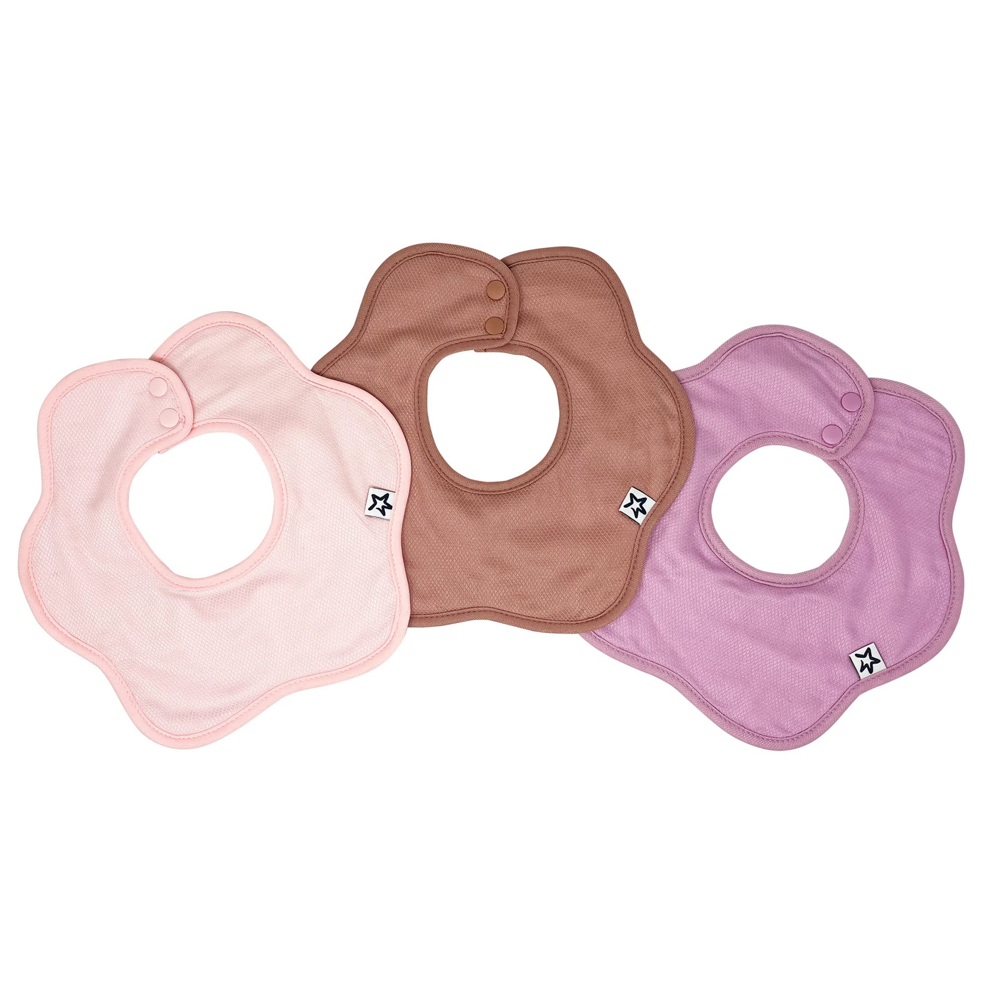 Tiny Twinkle Roundabout pink 3-pack closeup highlighting absorbent outer layer catching dribbles.