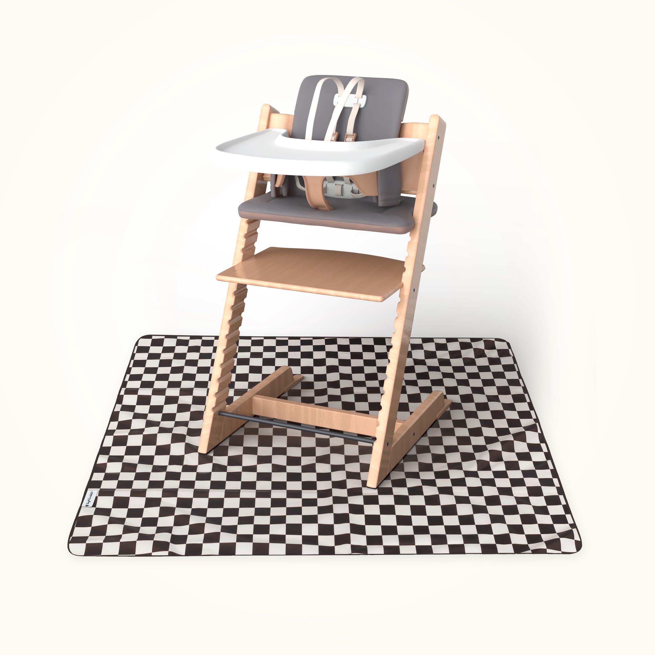 Tiny Twinkle Splat Mat under high chair protects floors during meals.