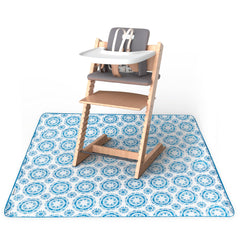 Tiny Twinkle Splat Mat under high chair provides full coverage for mealtime messes.