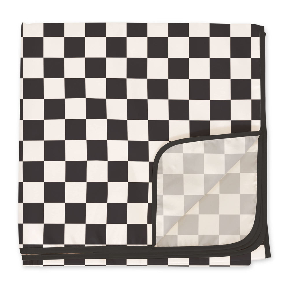 Tiny Twinkle Splat Mat waterproof fabric protects surfaces from spills.