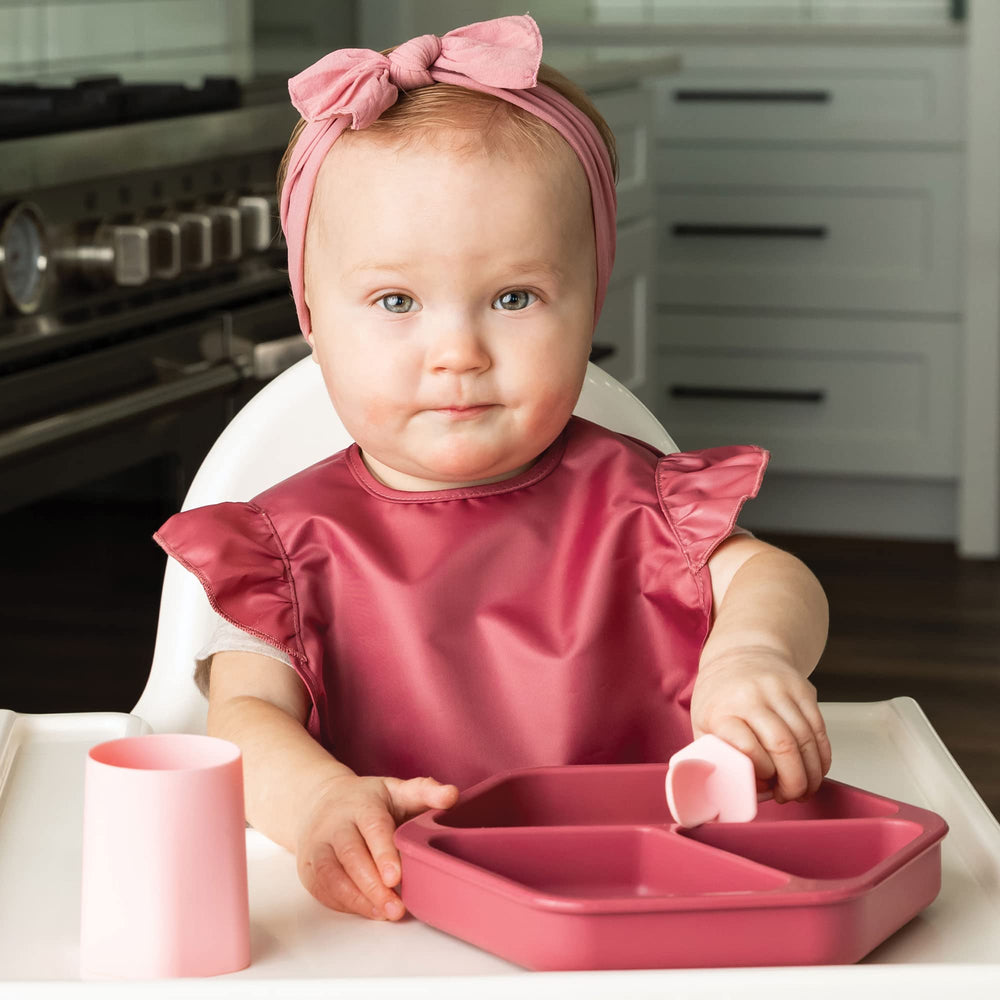 Tiny Twinkle suction base closeup shows strong grip on flat surface during feeding.