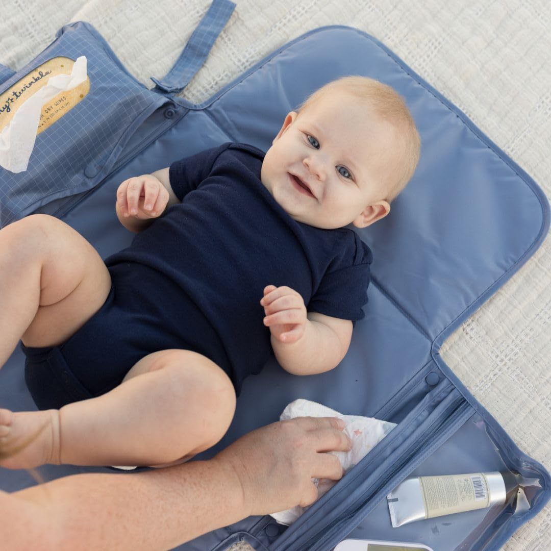 Tiny Twinkle travel changing station converts any surface to a clean changing spot