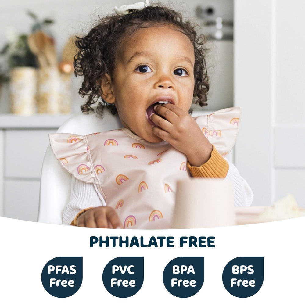 Tiny Twinkle waterproof bib protects outfits during toddler mealtime.