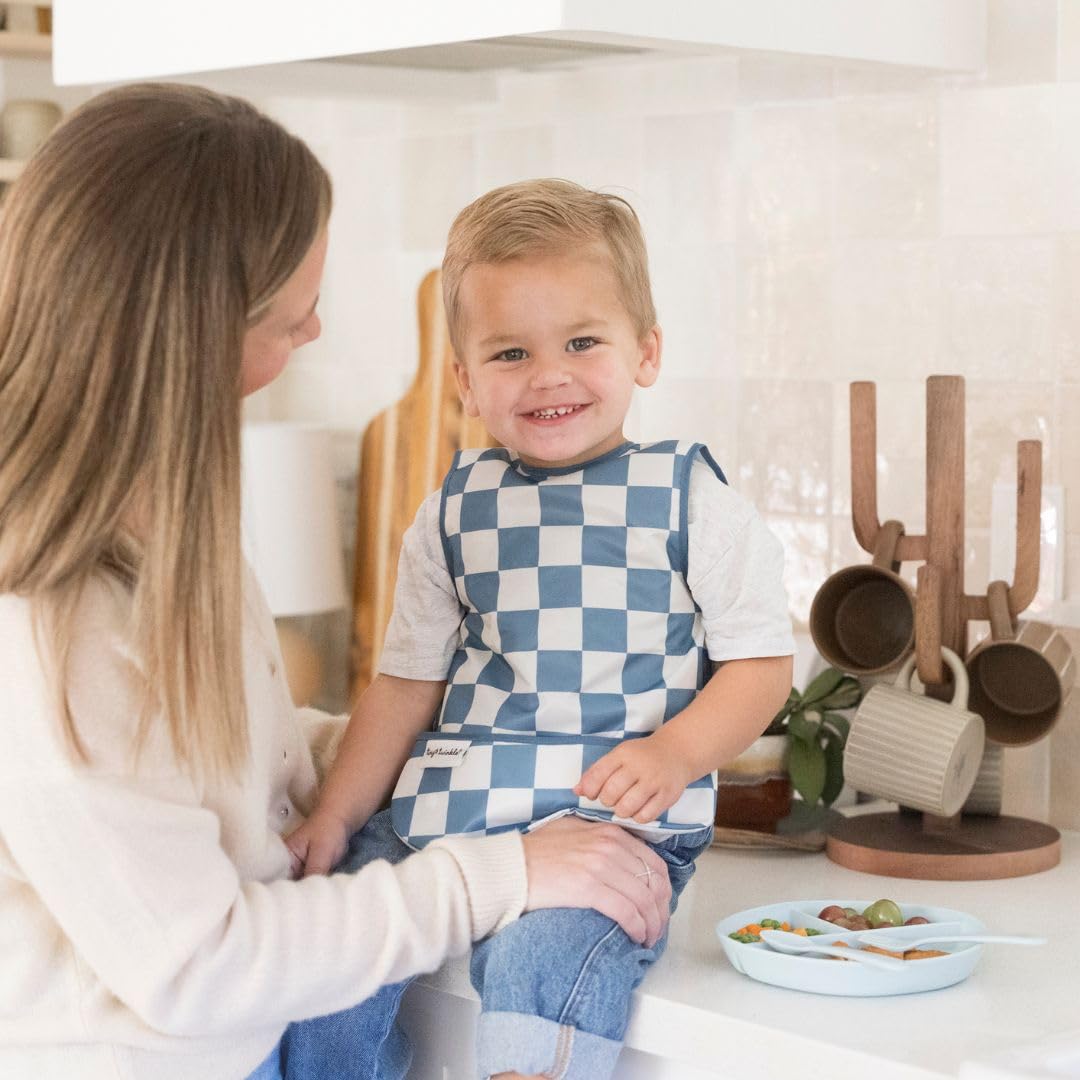 Tiny Twinkle waterproof toddler bib provides splash protection during feeding.