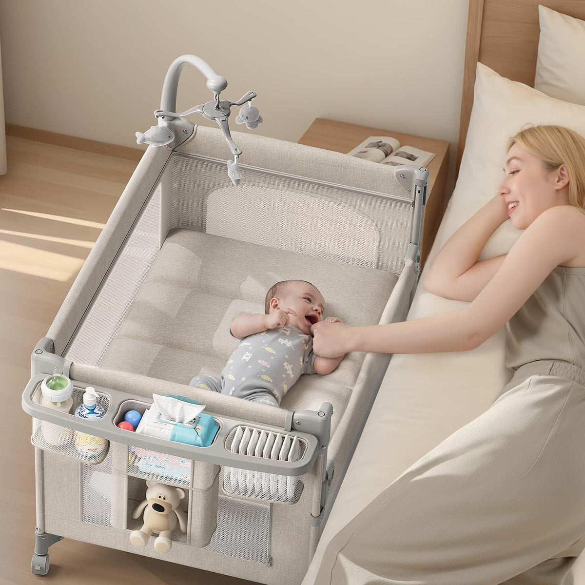 TinyGlow 4-in-1 baby bassinet folded for easy transport and storage.