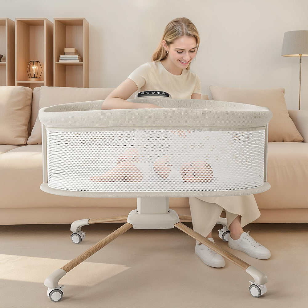 TinyGlow bassinet showing five rocking speeds for customizable soothing motion.