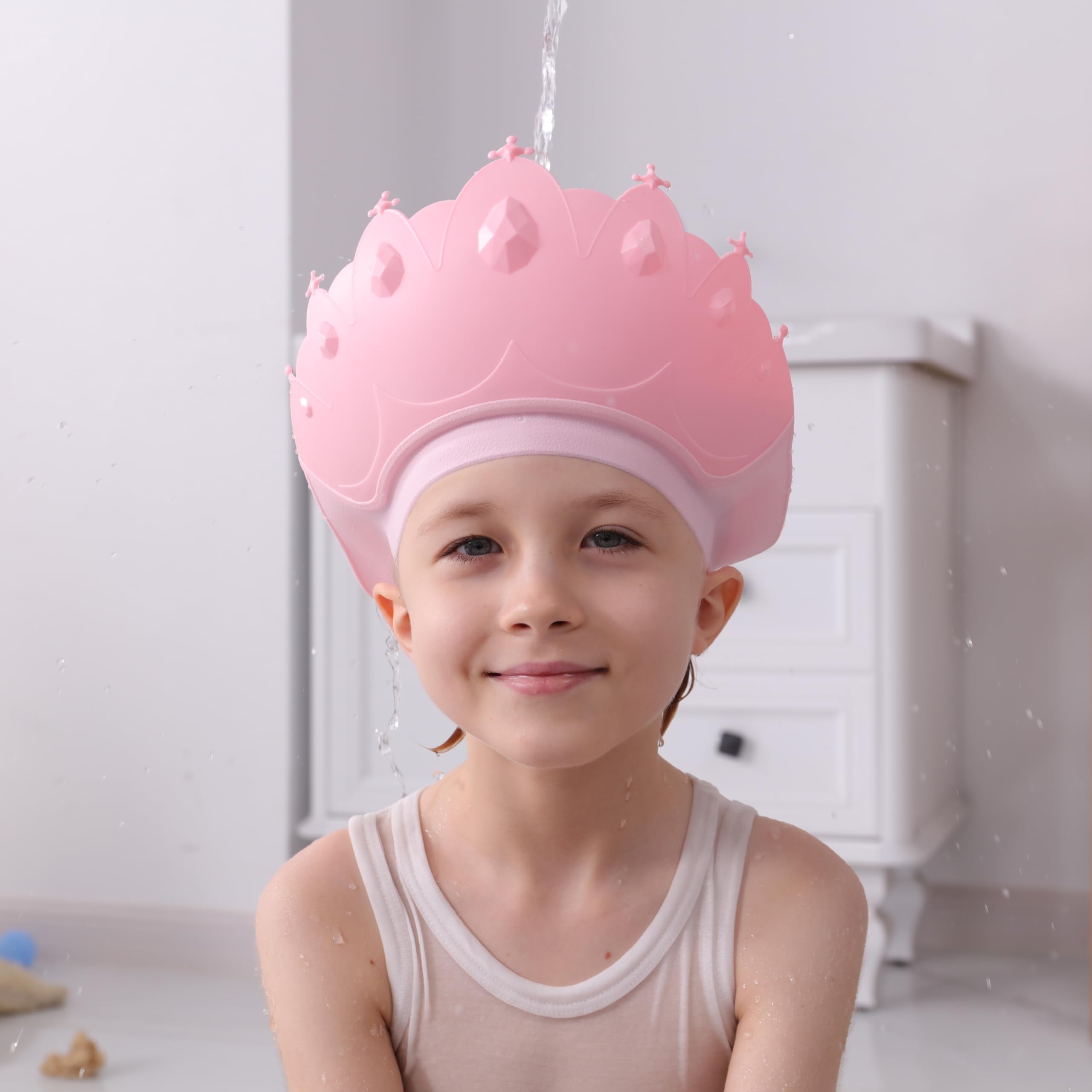 TinyGuardian pink baby bath cap serves as cute, practical bath-time accessory