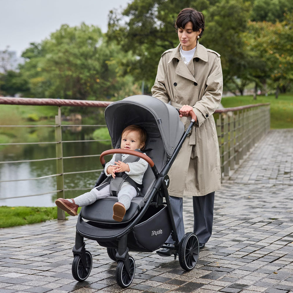 Tinyiota stroller one-hand fold demonstrates easy, compact storage for busy parents.