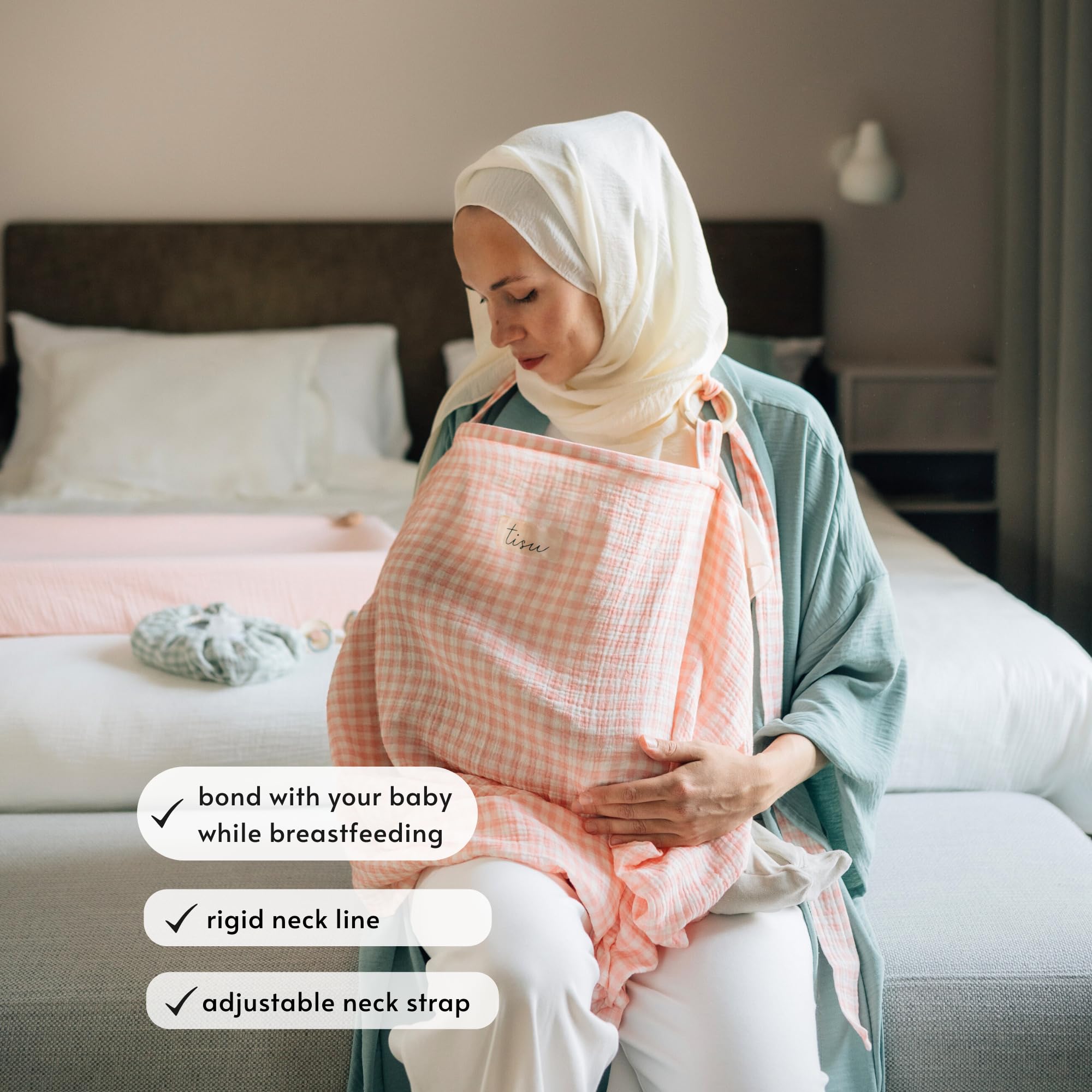 TISU nursing cover showing rigid-neckline and adjustable-strap for eye contact.