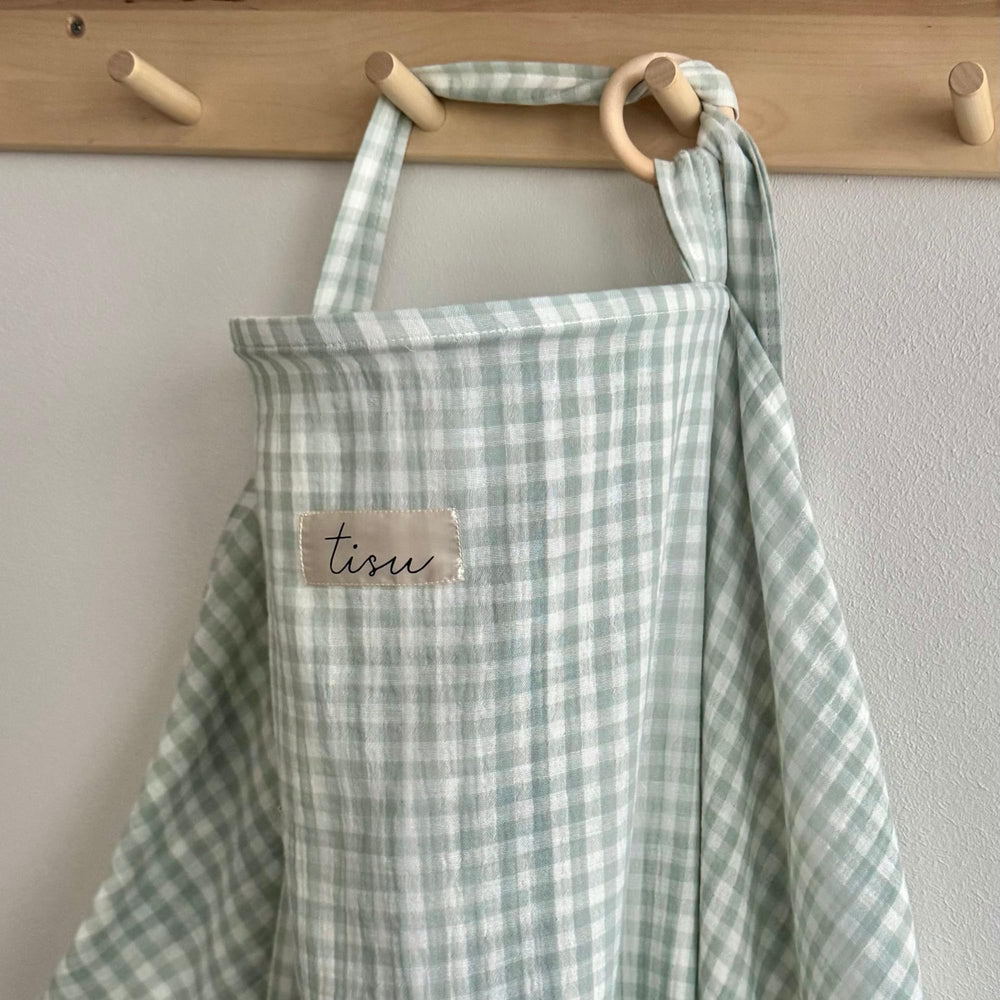 TISU nursing cover Light Mint Gingham worn by mom for discreet outdoor feeding