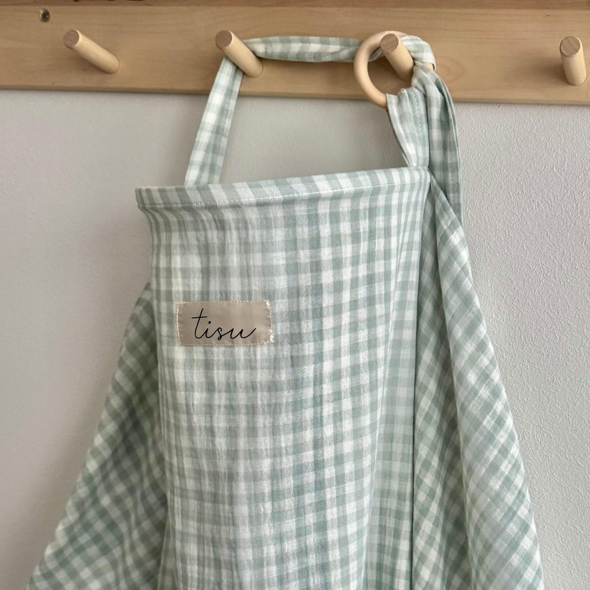 TISU nursing cover Light Mint Gingham worn by mom for discreet outdoor feeding