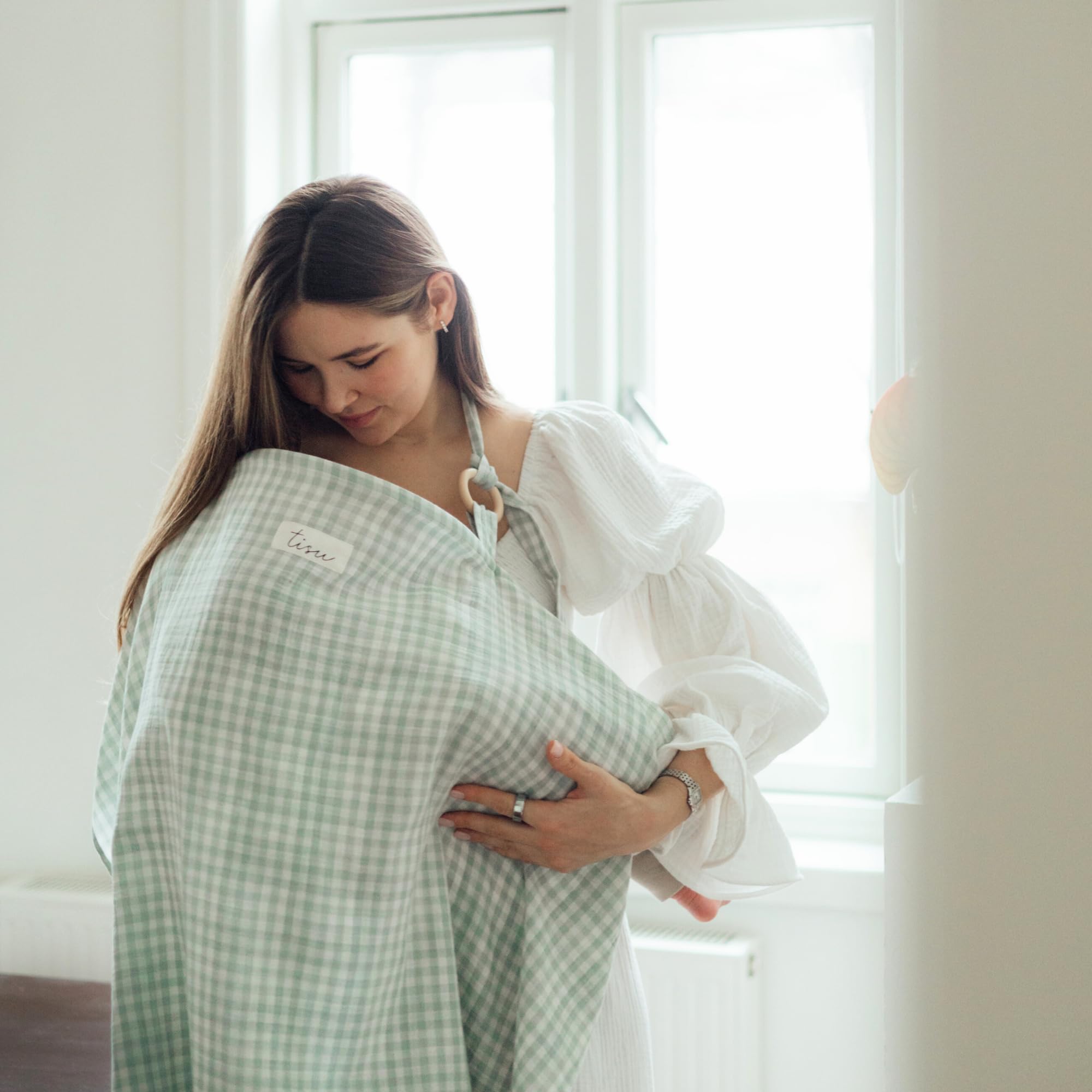 TISU nursing cover used as stroller cover protecting baby's sleep