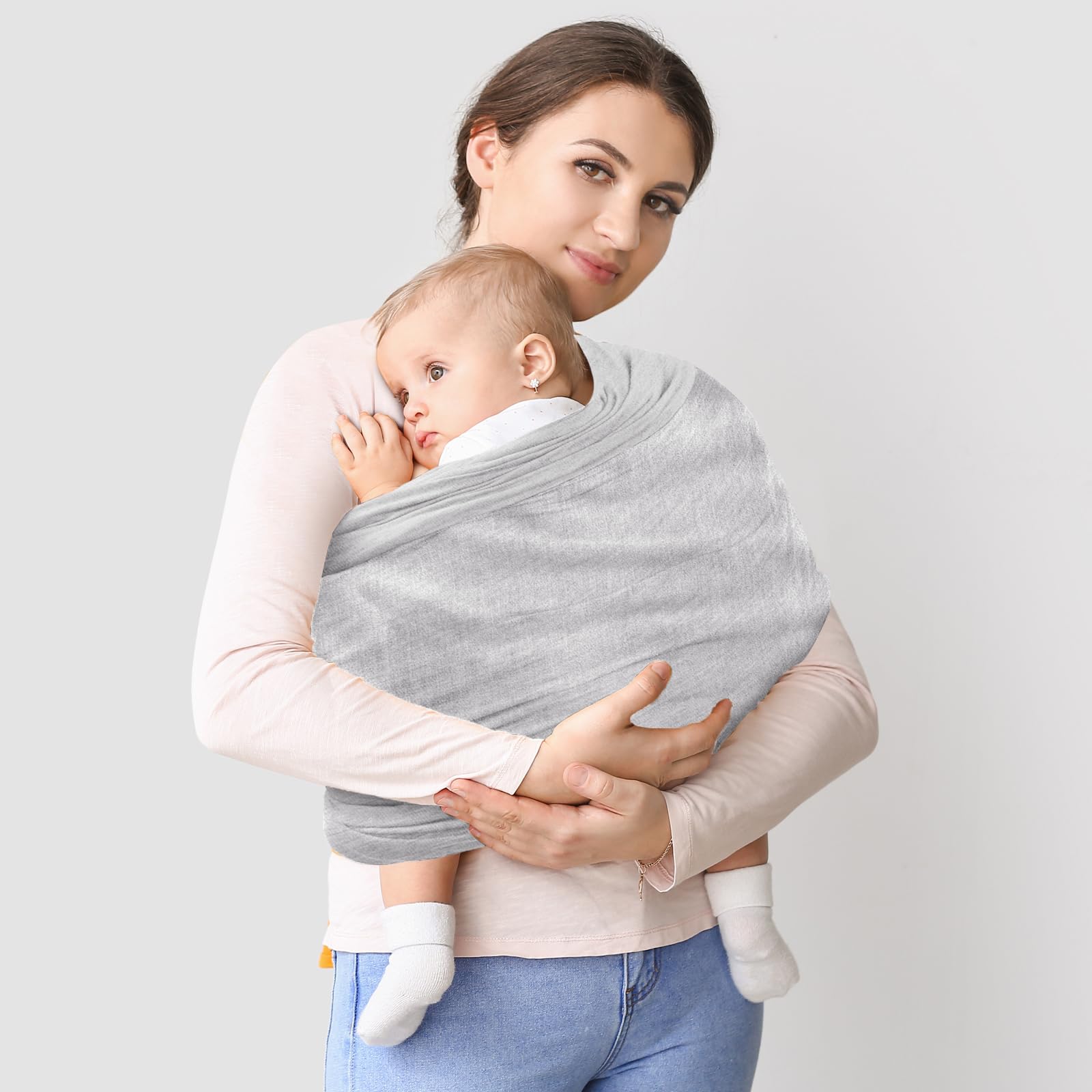 TKKOK Baby Wrap Carrier travel pack demonstrates portability.