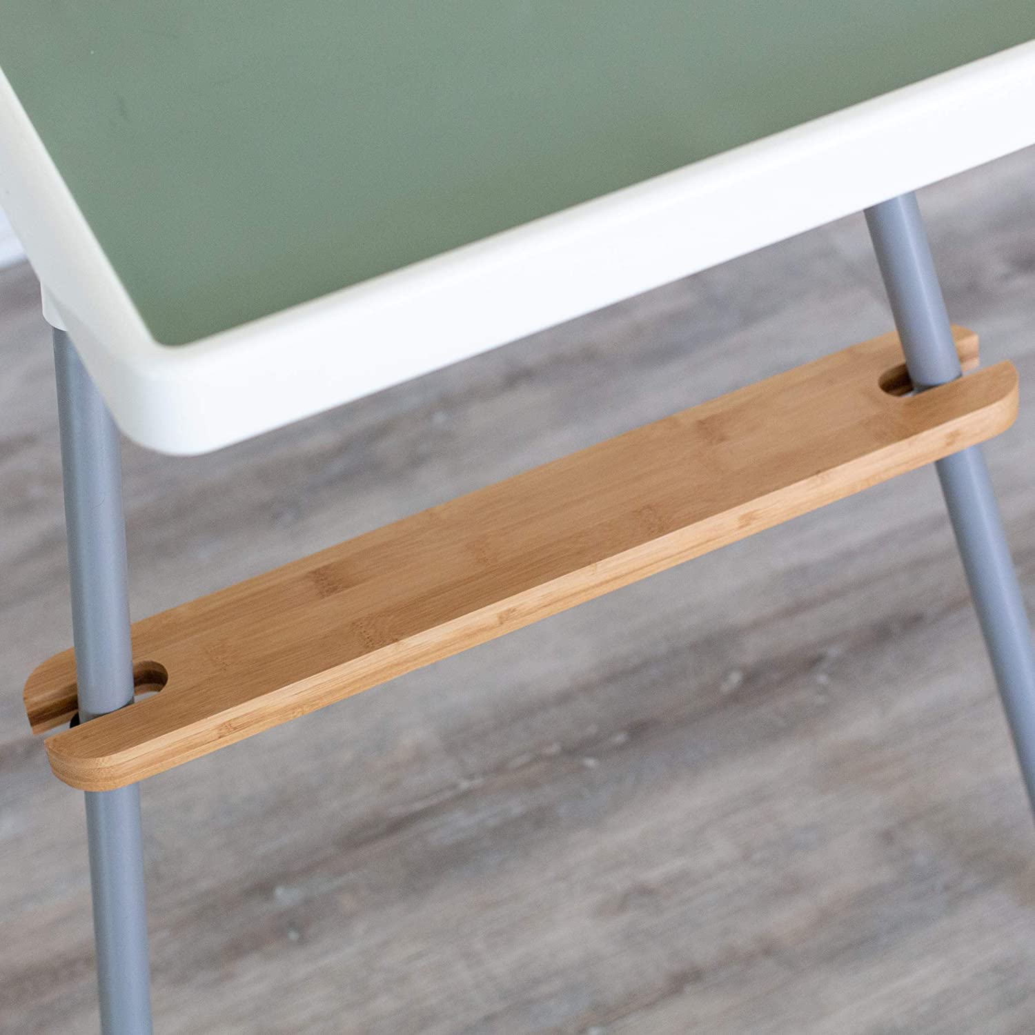 TLBB footrest in natural bamboo offers durable, warm support during mealtimes.