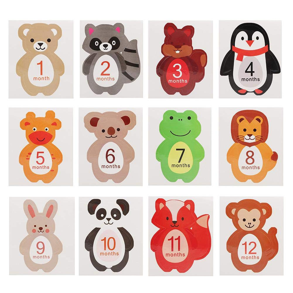 Tnfeeon animal-themed stickers pair with newborn photography props for memorable portraits.