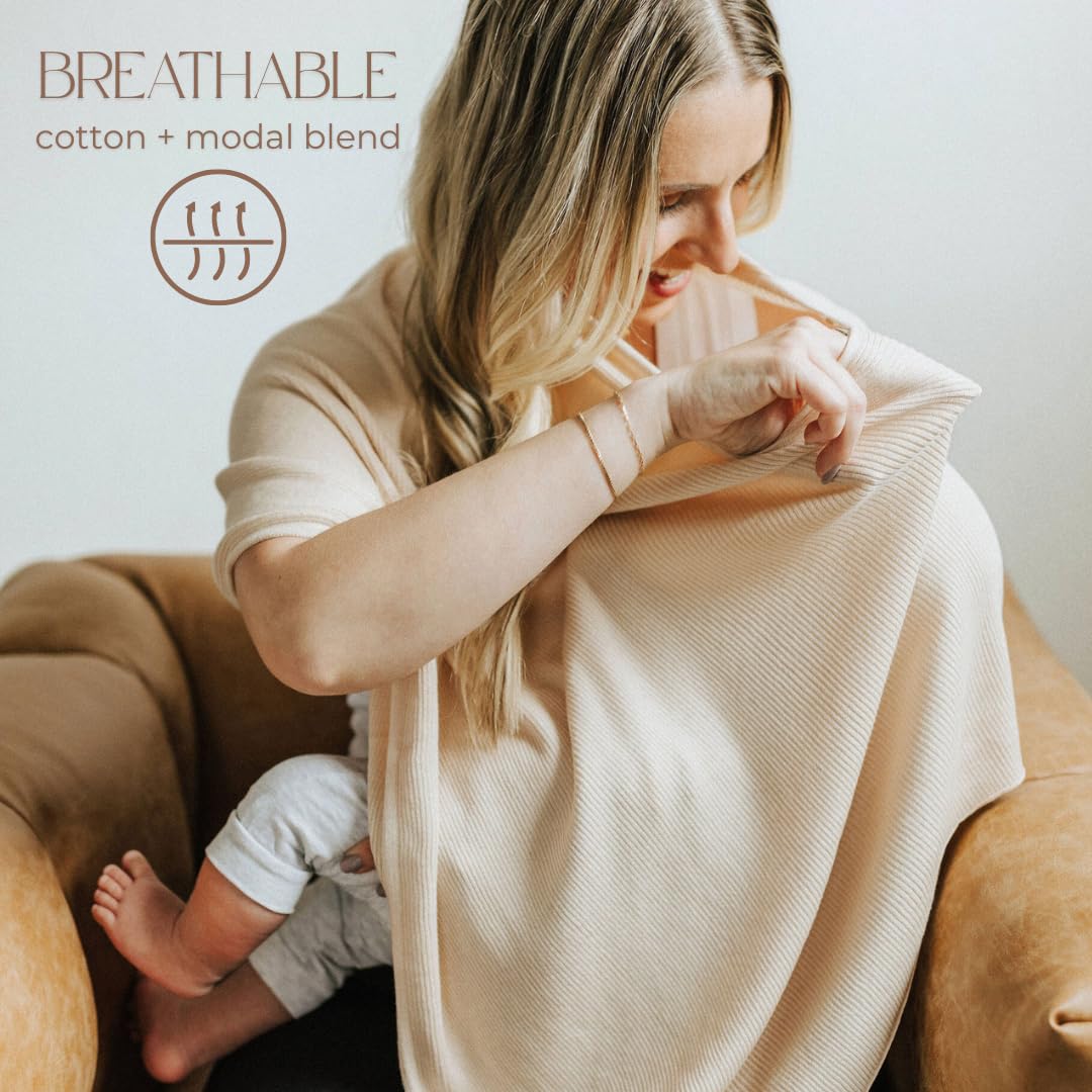 Toci Mom 360-degree coverage poncho on model providing privacy.