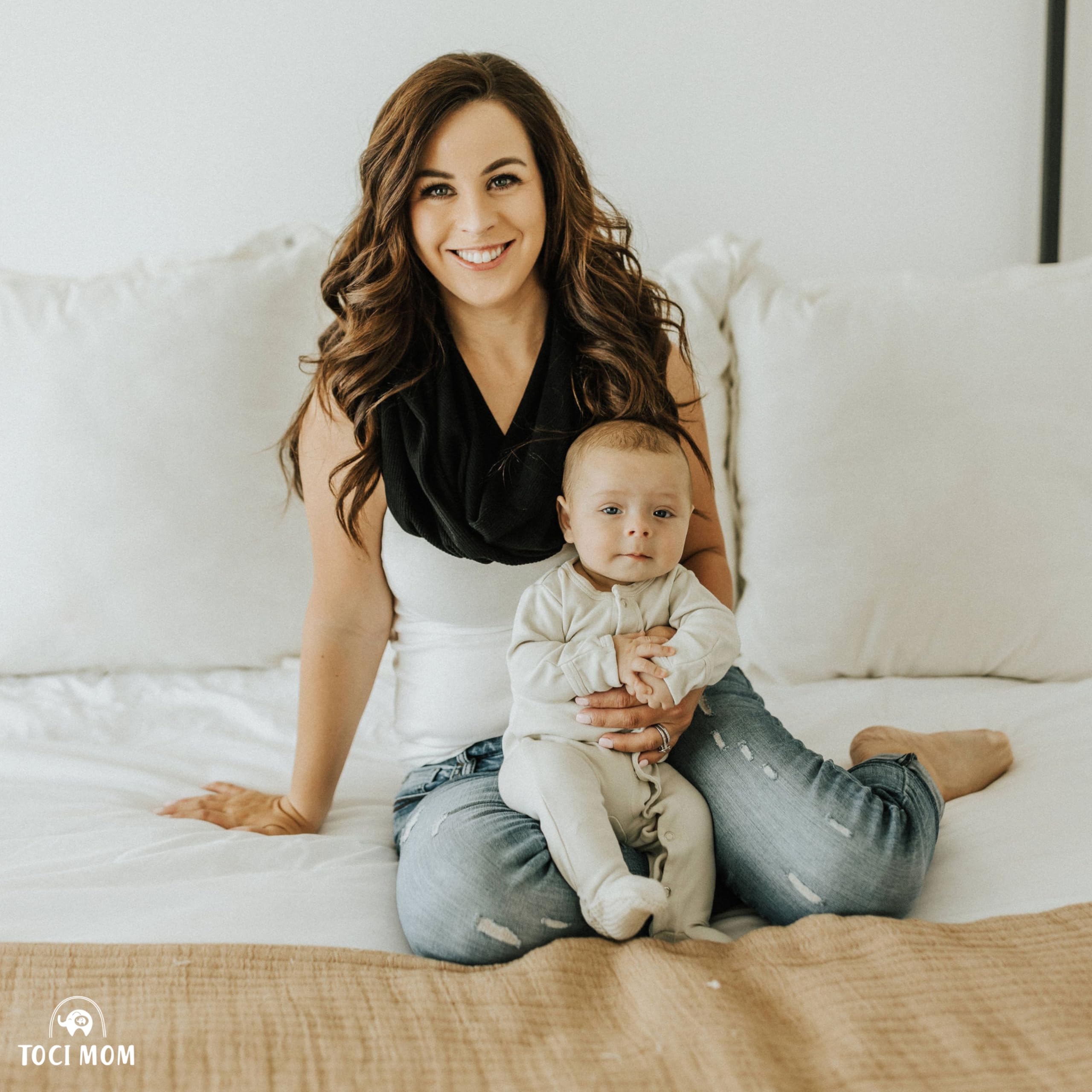 Toci Mom lightweight travel-friendly design shown folded in a diaper bag.