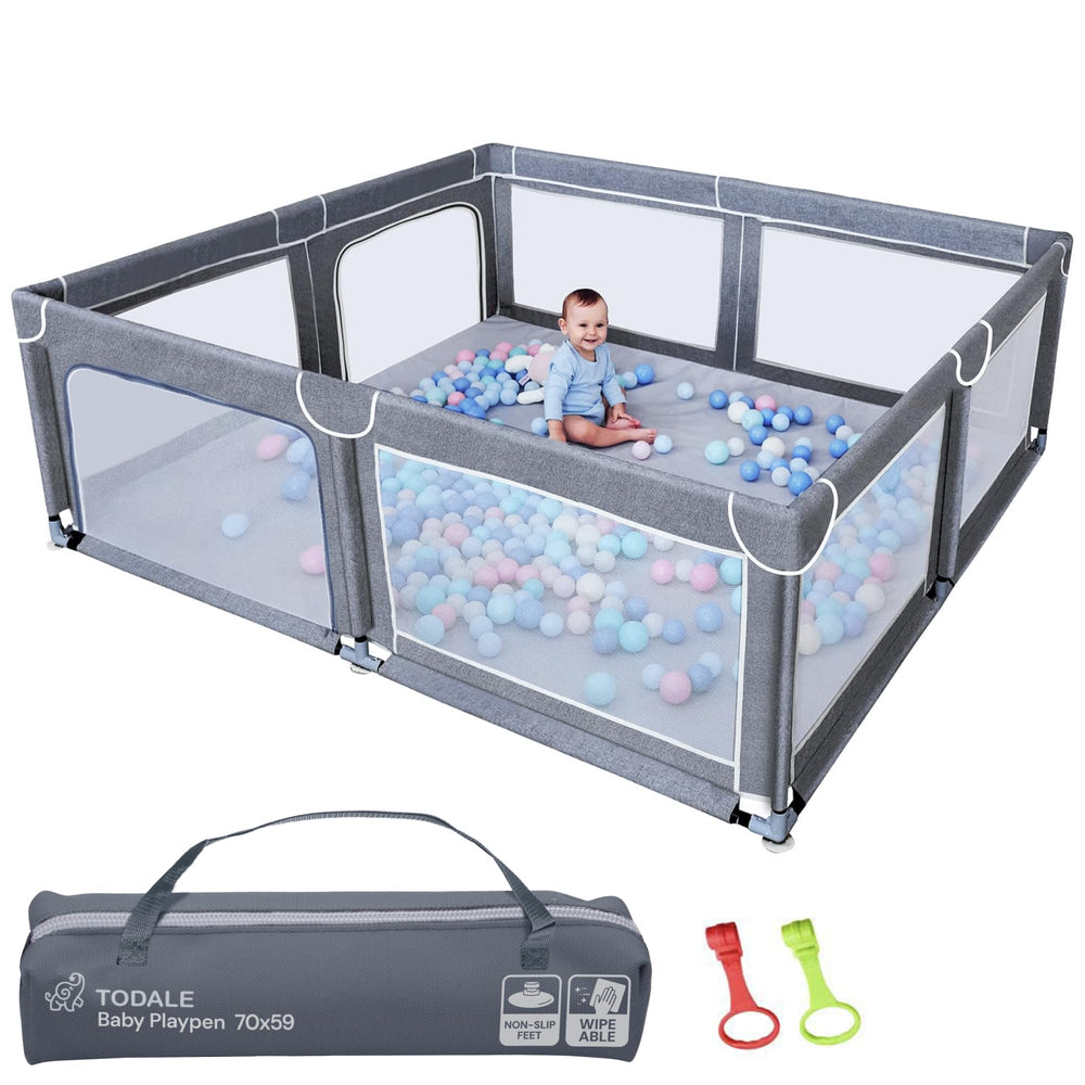 Todale Baby Play Yard wide view highlights the spacious interior for babies and toddlers.