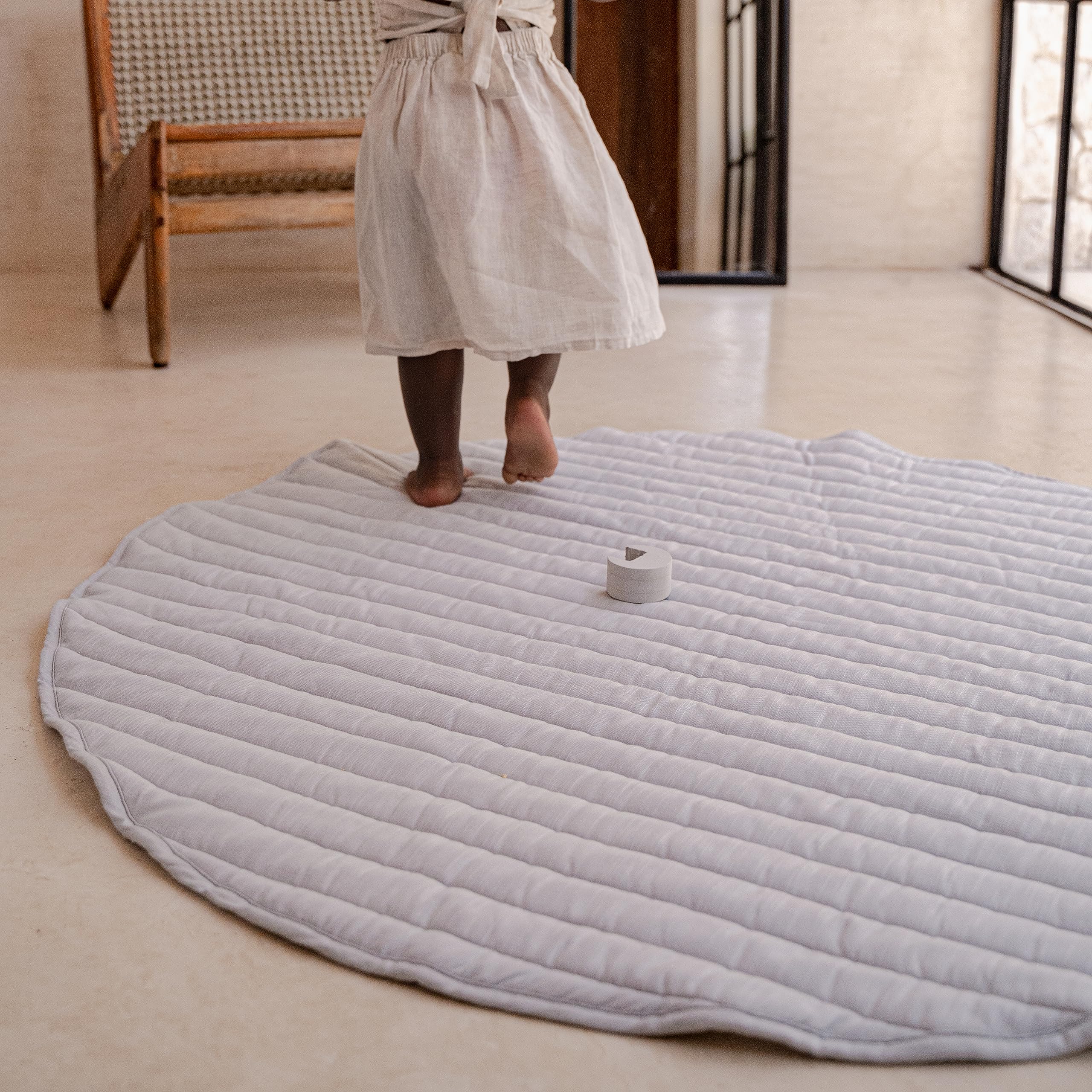 Toddlekind 100% Organic Cotton close-up highlights safe, soft fabric for babies.