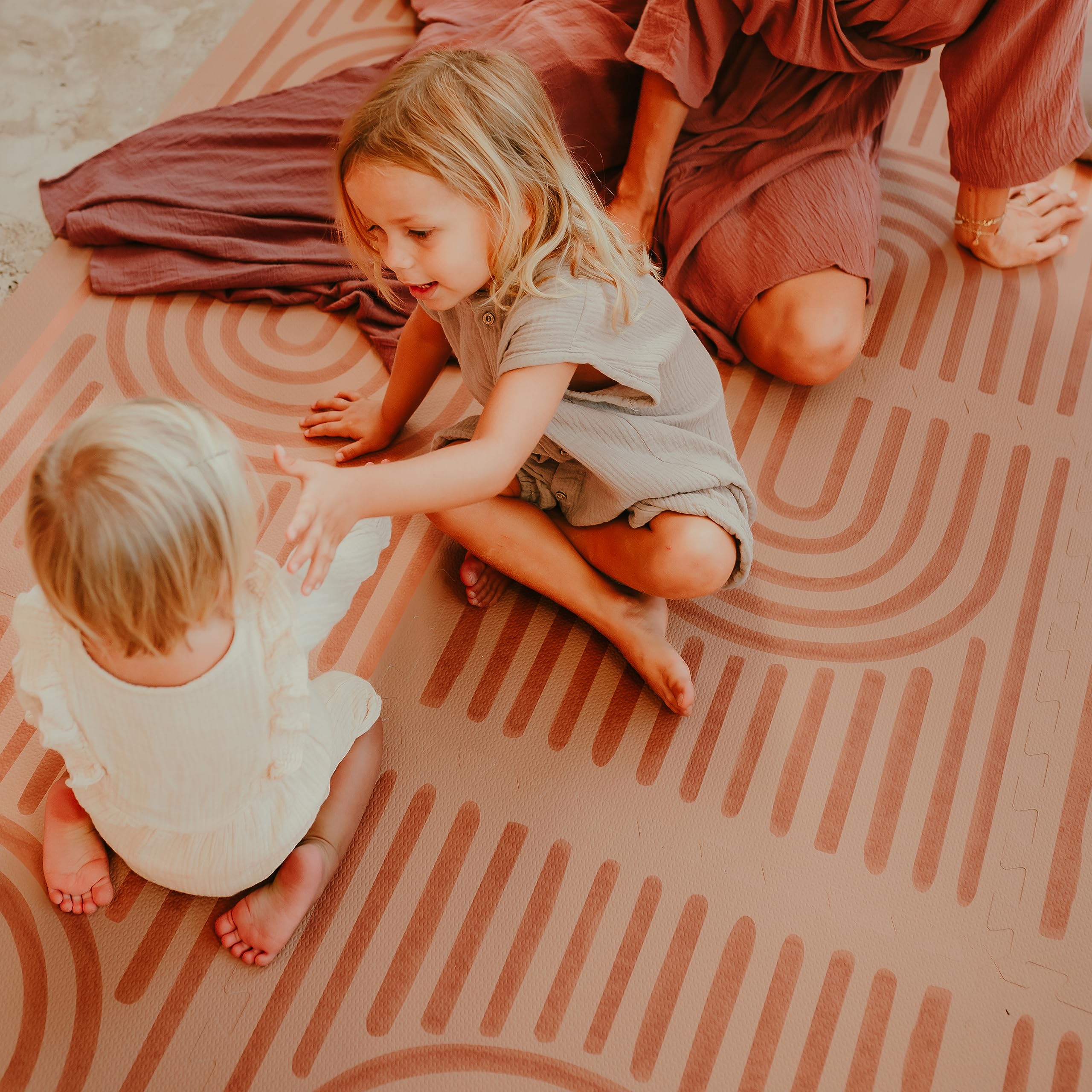 Toddlekind Playmat easy-care surface helps keep nurseries clean after play sessions.