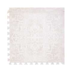 Toddlekind playmat off-white tile closeup shows soft, cushioned surface for safe tummy time.