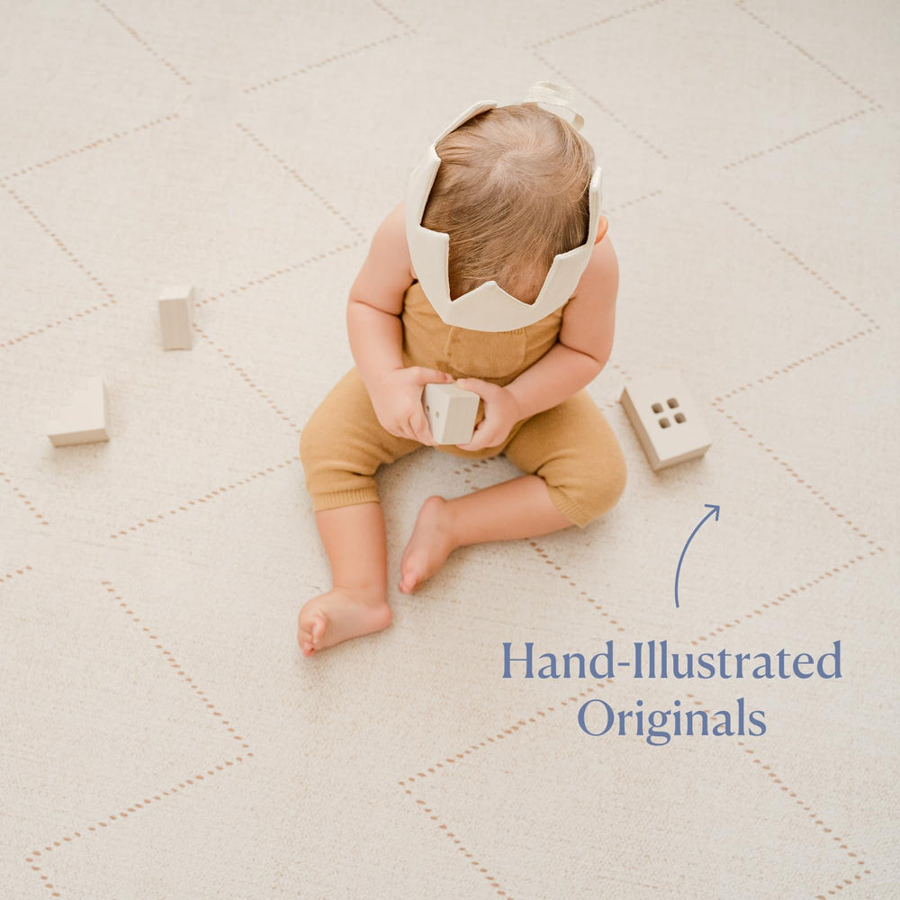 Toddlekind Playmat off-white extra-thick foam cushions every movement during crawls.