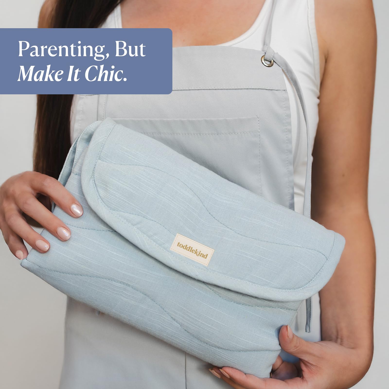 Toddlekind Mini Maven pocket-organization-blue includes space for diapers, wipes, keys, and phone