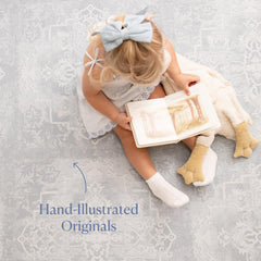 Toddlekind Pearl Blue rug-inspired design blends into nursery decor.