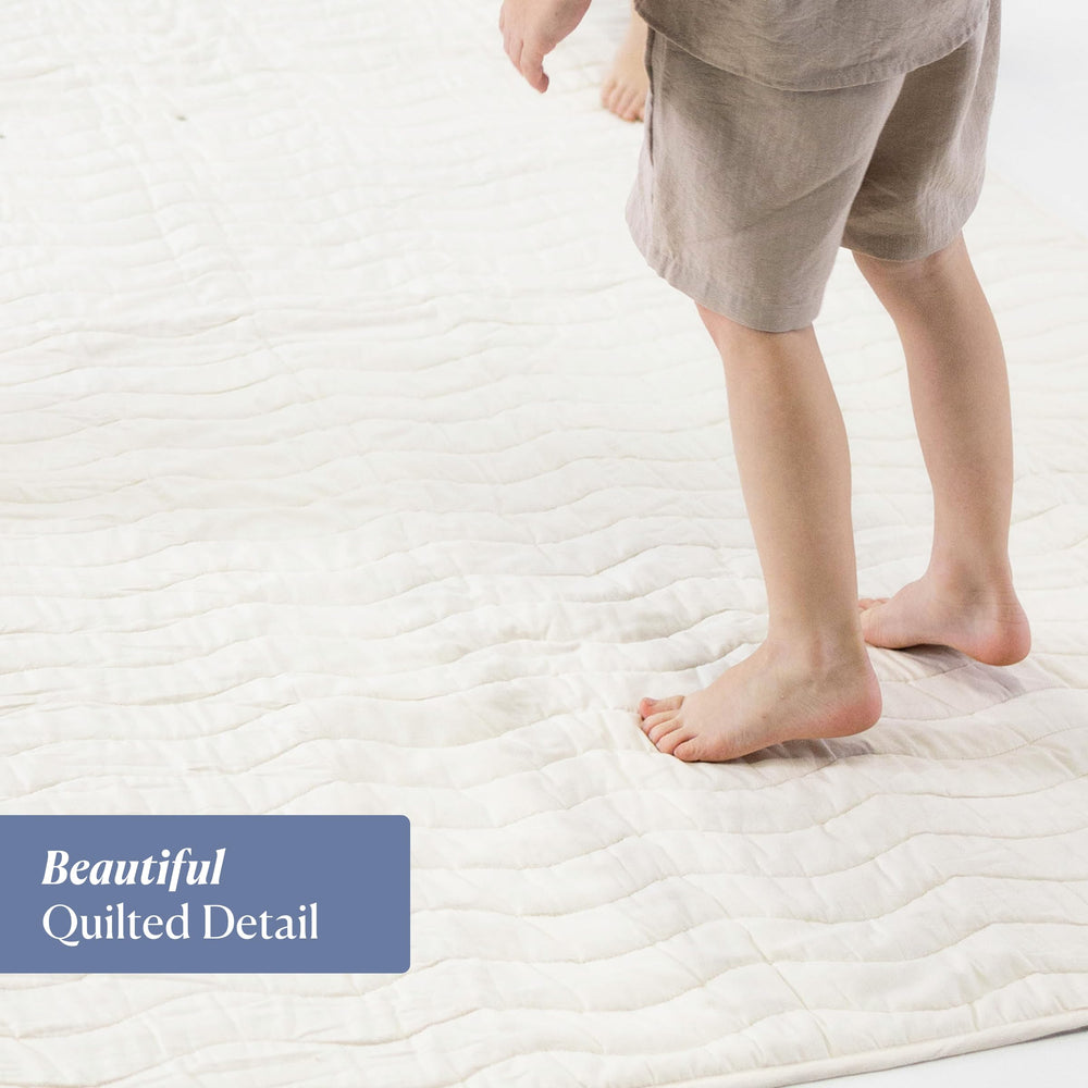 Toddlekind premium playmat roll-up carry handle enables easy transport and storage.