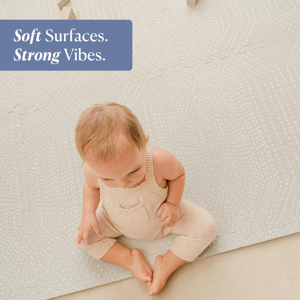 Toddlekind Playmat ultra-thick foam closeup in cream highlighting cushioning for new crawls.