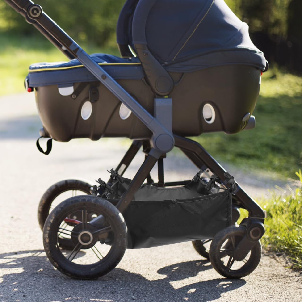 Toddmomy stroller bottom storage capacity holds bottles, snacks, and small essentials.