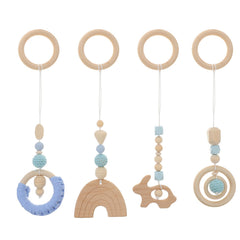 Toddmomy teething rings on wooden baby gym for motor skill play