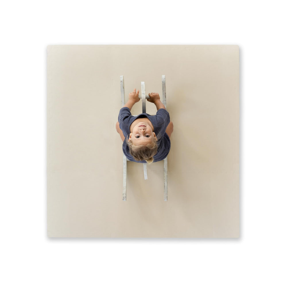 Toddlekind classic foam tiles laid out 4x4 feet for a safe, stylish play area.