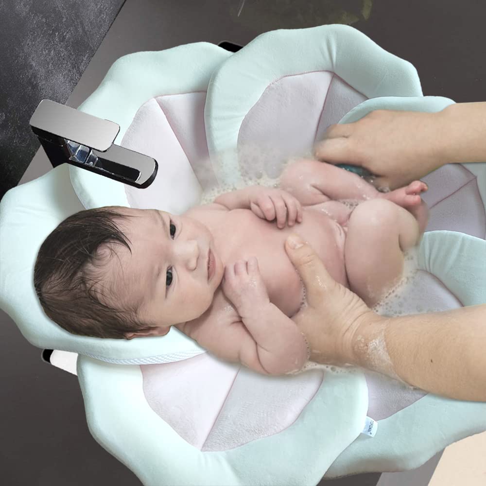 TOFOAN Bath Pad contoured petals cradle baby for secure seating.