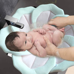 TOFOAN Bath Pad contoured petals cradle baby for secure seating.