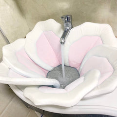 TOFOAN Baby Bath Pad in sink demonstrates snug fit for safe bathing.