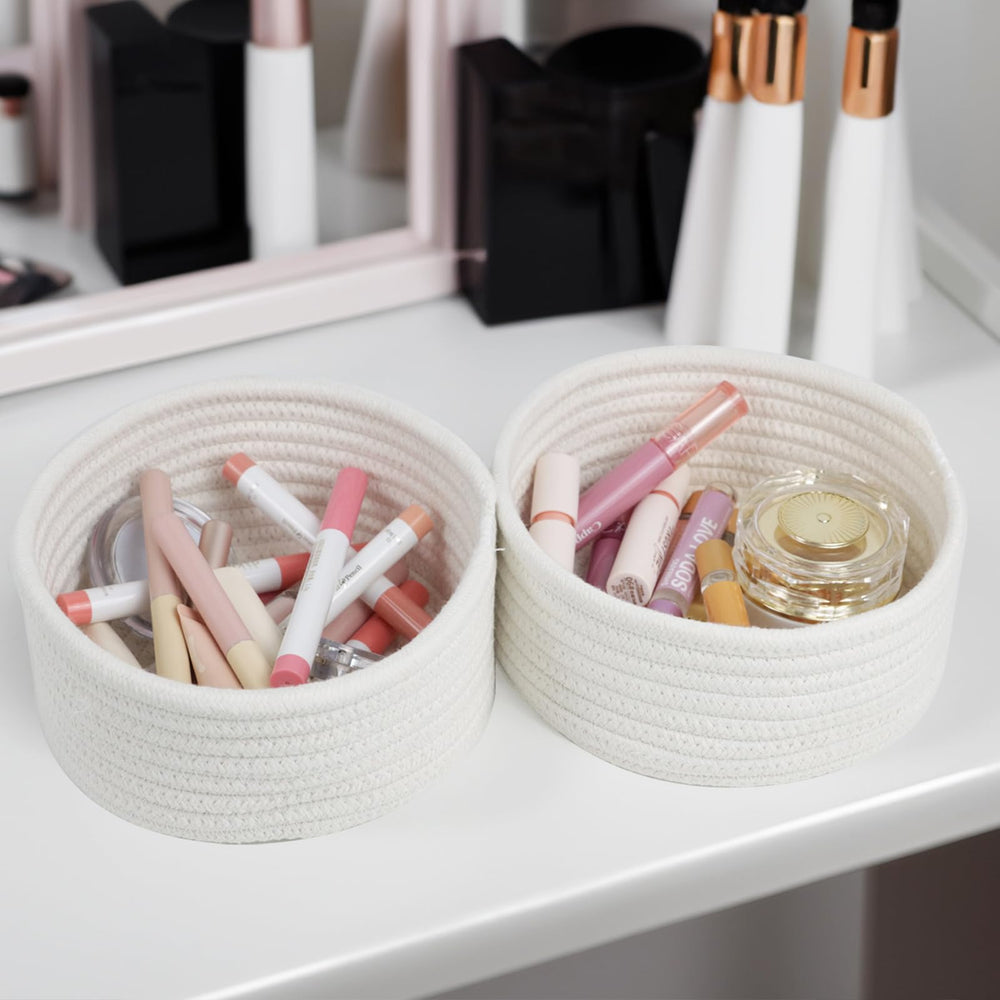 Togous nursery basket sits by crib for safe, soft storage.