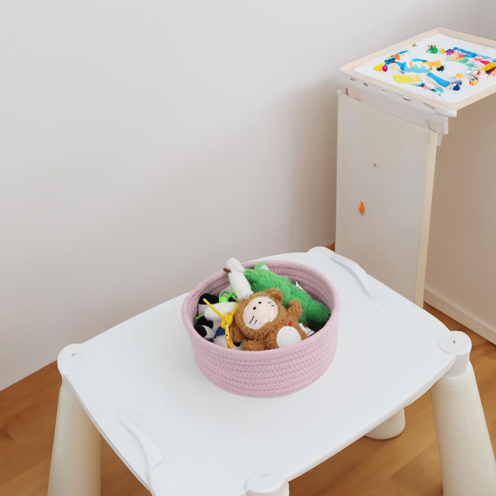Togous small storage basket pink set 3 bathroom shelf shows neat toiletries on display.