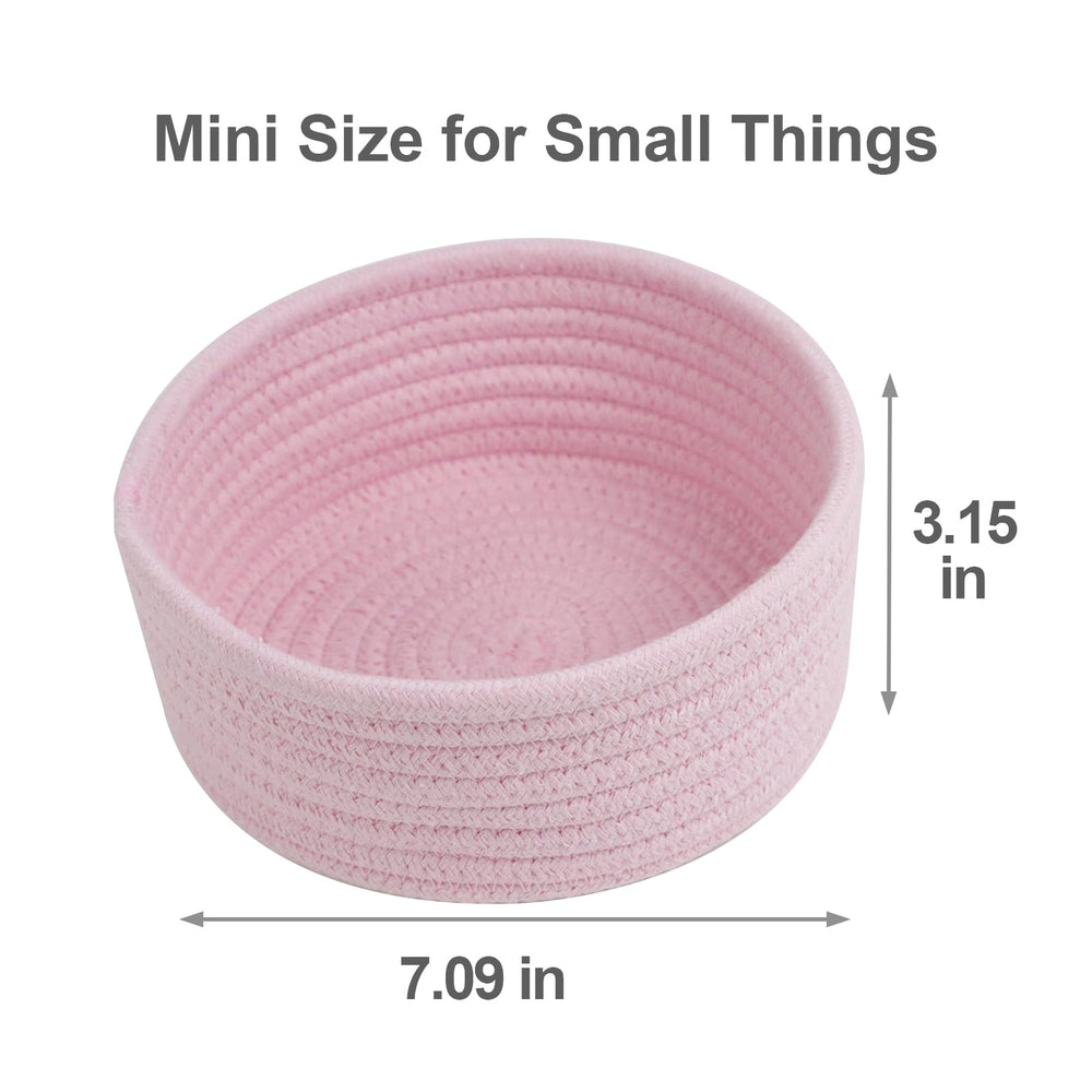 Togous small storage basket pink set 3 inside usage illustrates tidy remotes and cosmetics storage.