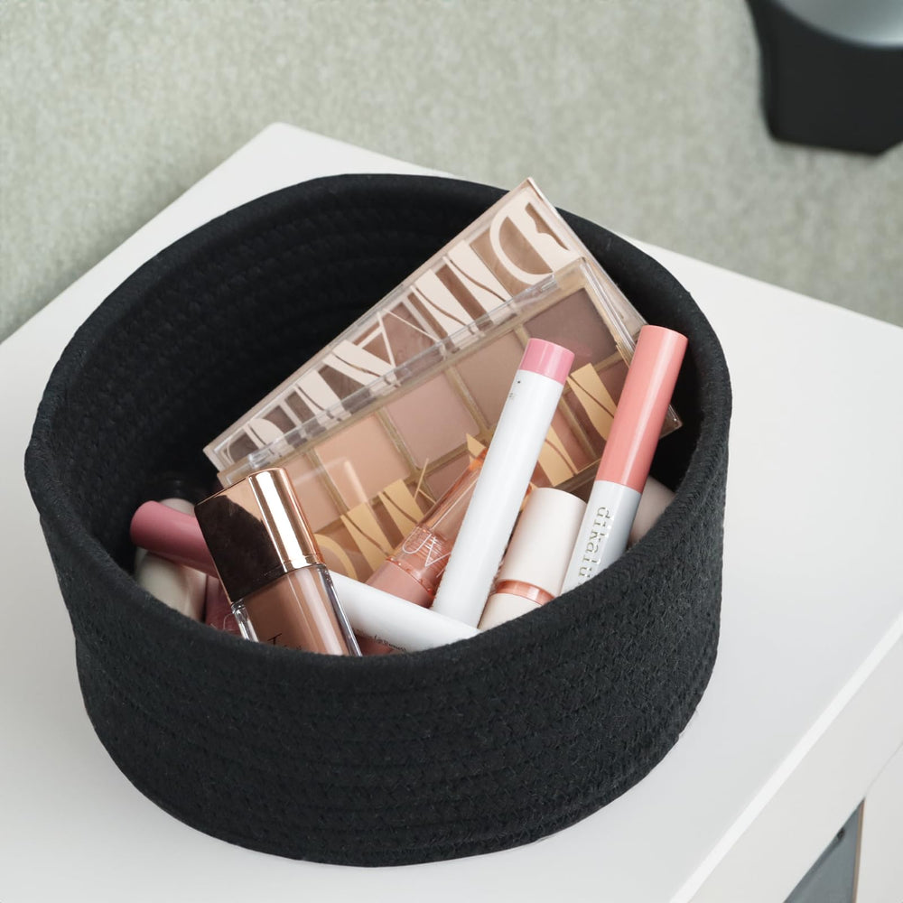 Togous stackable baskets on a coffee table display daily essentials.