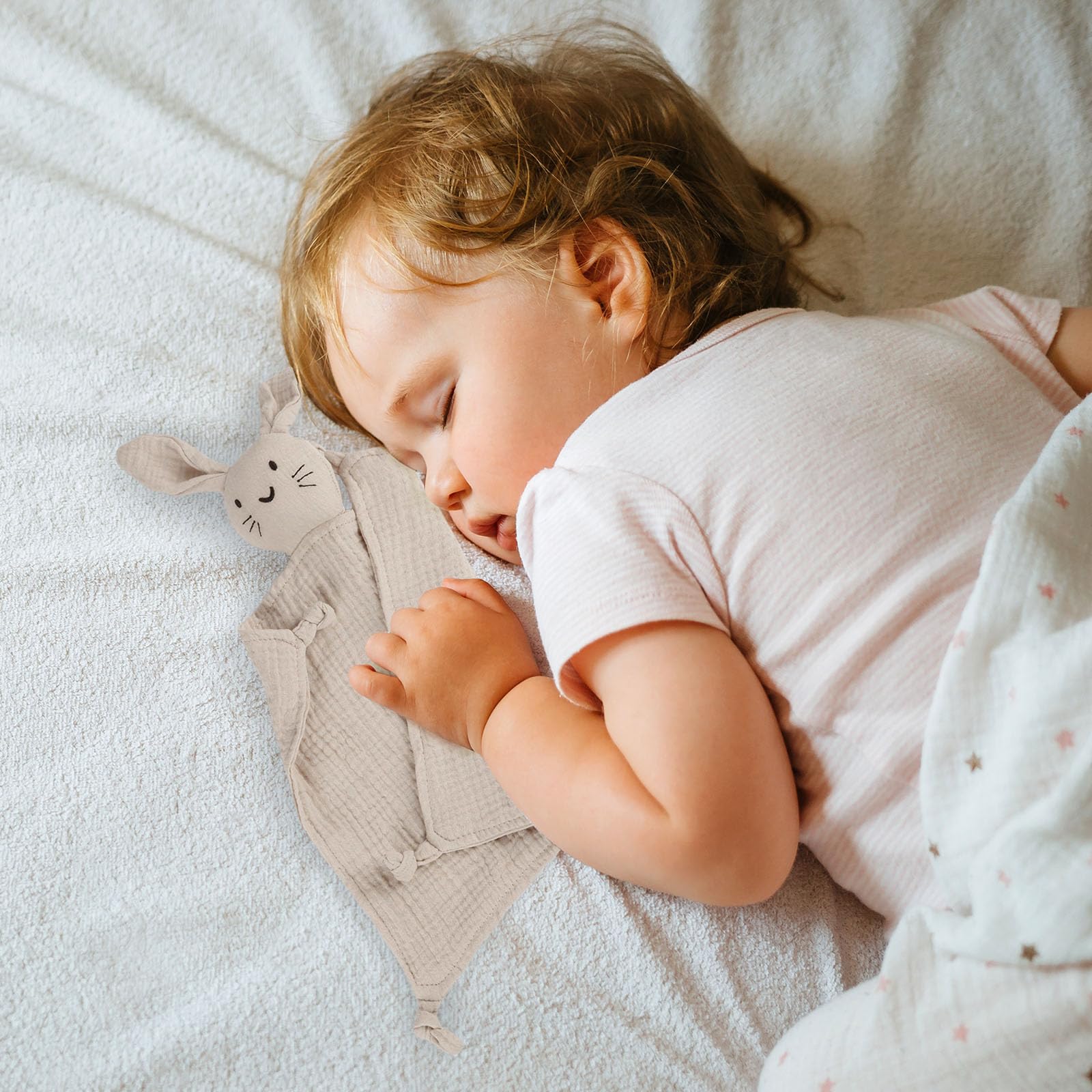 TOHARA bunny lovey machine-washable tag highlights easy care and lasting softness.