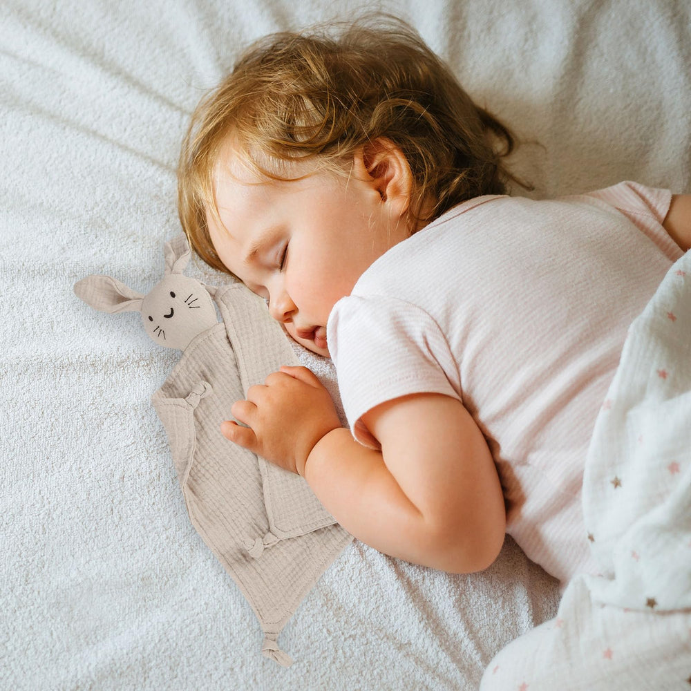 TOHARA bunny lovey machine-washable tag highlights easy care and lasting softness.