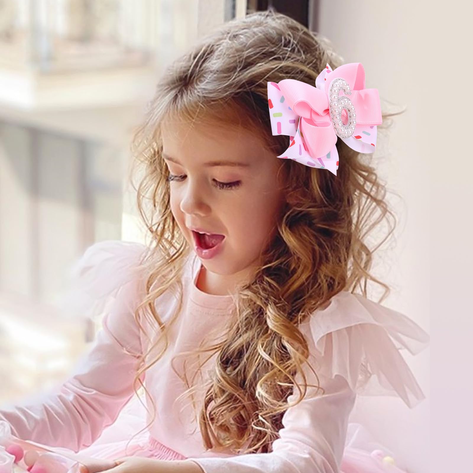 TOKUFAGU glitter-number bow detail adds milestone flair without flaking